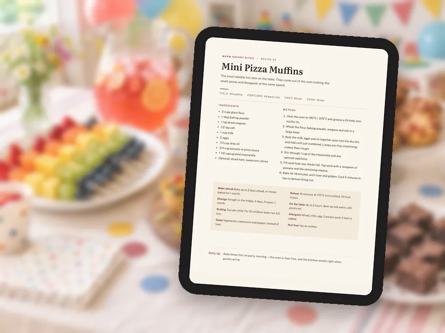 A recipe page open on a tablet at the party table